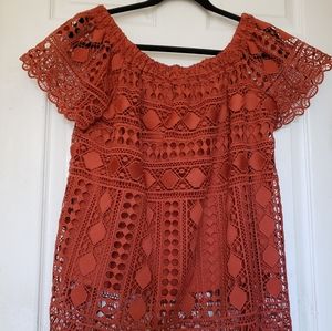 Maurice's rust coloured blouse